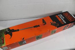 A boxed as new Black and Decker 28cm cordless strimmer (Battery and charger included).