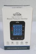 Forty boxed as new Simbr Blood Pressure Monitors (Upper Arm Electronic).