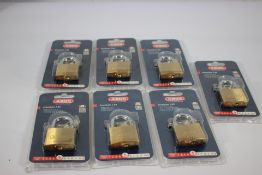 Six as new Abus Premium 65/40 security level 5 brass padlocks.