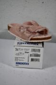 A pair of children's Arizona Shearling fur lined light Rose Birkenstocks (Size UK 2 (34)).