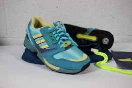 A pair of as new Adidas ZX 8000 Originals in Clear Aqua/Light Aqua/Shock Yellow, Size UK 8 (No Box).