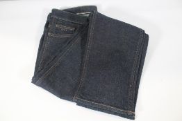A pair of men's as new Boss Delaware Slim-Fit Jeans - Dark Blue (UK 32/30).