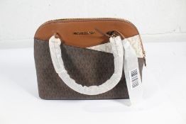 An as new Michael Kors Jet Set medium two tone graphic logo satchel.