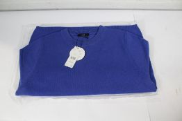 A women's Oui blau jumper with two pockets to front (Size 40).
