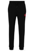 Men's Hugo Cotton-Terry Tracksuit Bottoms with Red Logo - Black (S, stock photo).
