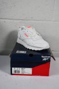 A pair of women's boxed Reebok Glide running trainers FTWWHT/PNKGLW/CHERRY (Size UK 6.5).