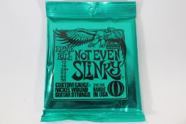 Ten packs of Ernie Ball 2626 Not Even Slinky Custom Gauge Electric Guitar Strings (12 - 56).