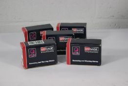 Five boxed as new Brigade white sound reversing and warning alarms.