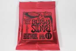 Ten packs of Ernie Ball 2226 Burly Slinky Electric Guitar Strings (11 - 52).