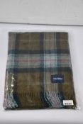 An Architex Skye Olive Shet Throw T0892/DW59