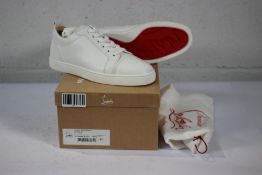A pair of boxed as new Christian Louboutin Louis Junior Calf Leather Trainers in White, Size 40 UK S