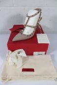 A pair of women's boxed as new Valentino Garavani Rockstud Heels - Nude (EU 42).