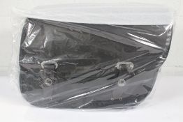 An as new Triumph Black Right Hand Wax Cotton Pannier A9518290.