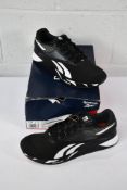 A pair of unisex boxed Reebok Nano X3 in CBlACK/FTWWHT/SMAORA (Size 10.5) (Box slightly damaged).