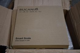 Nine boxed Bucanim smart scales.
