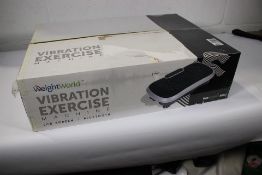 A boxed as new Weight World vibration exercise machine (TD006C-12).