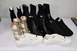 Seven pairs of assorted Carvela Shoes/Boots, No Boxes, Good-New Condition.