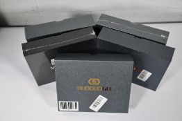 Three DuoDuoGo J6+ smart phones, a DuoDuoGo p30 smart phone and a V.Mobile S9 smart phone.