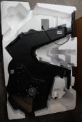 An unboxed Tacx Neo Bike smart trainer (Viewing advised, parts missing).