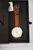 Five Zenn Classique watches with brown strap and silver surround.