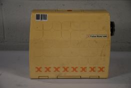 A pre-owned Vintage Frister Rossmann Club 4 sewing machine with original case.