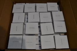 A large quantity of TWS earbuds in charging cases (Approximately 110 items).