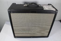A pre-owned Fender Hot Rod Deville 212 IV Combo Amp (Note: Warranty repair - new tubes).
