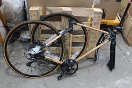 A Spedagi Dalanrata Bamboo Road Bike (Bike has damage and front forks will need replacing, viewing i