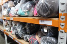 Twenty four bags of pre-owned clothing and related items.