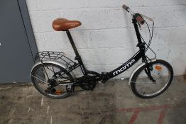 A pre-owned Montana fold up bike in black (Some damage requires attention, viewing advised).