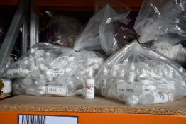 Approximately one hundred and twenty five Octopus Fluids Alcohol Ink Blending Solution (100ml).