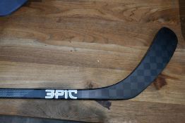An as new Epic trademark ice hockey stick (Right handed).