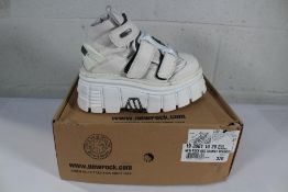 A pair of women's New Rock Mid Chunky Trainers - White (As new but some minor markings).