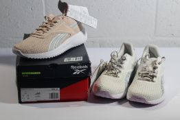 A pair of women's Reebox Lite Plus 3 running trainers in Chalk/Cloud White/Purple Oasis (Size UK 5.5