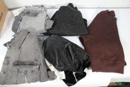 Five items of Good American clothing to include straight leg jeans (Size 10), a black denim jacket