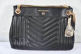 An as new Michael Kors Black Leather Susan Shoulder Bag.
