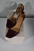 A pair of Sergio Rossi Vitello David Rubino Scarpe Donna Kitten heel sandals (Size 40 1/2).