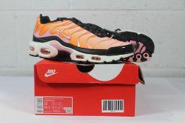 A pair of women's as new Nike TN Air Max Plus in Soft Pink Orange, Size UK 8. (Note: Box isn't the o