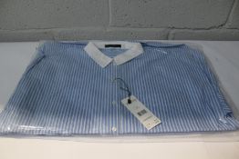 A women's Oui loose fit shirt in blue/white (Size 42).