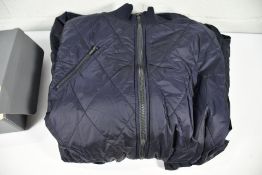 An as new Wild Swans 22.3 Project AJ Nuka Quilted Parka Coat in Midnight, Size M.