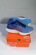 A pair of Nike ZoomX Invincible Run FK 2 trainers in Game Royal/Red Clay (Size UK 8.5).