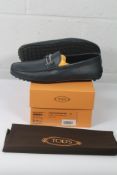 A pair of as new Tod's Navy City Gommino leather driving shoes (Size 9, boxed).