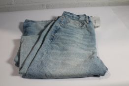 A pair of Frame Le Jane high - rise straight fit jeans (Size 28).