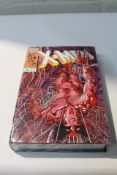 A Marvel The Uncanny X - Men 25th Anniversary hard back book.