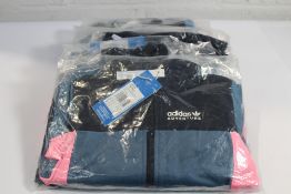 Six children's Disney Mickey and Friends Tracksuits In Altered Blue/Beam Pink/Legend Ink (Sizes 2 x