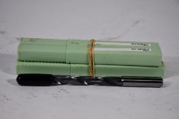 Four Walter AG Titex DC150-08-10.500A1-WJ30TA solid carbide drills bits with coolant through.