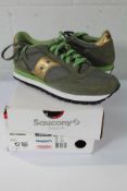 A pair of boxed as new Saucony Jazz Original - Olive/Gold (UK 7).