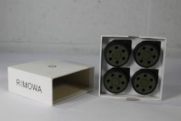 An as new set of four Rimowa Cactus Green Suitcase Wheels.
