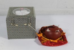 An as new Red Blossom Tea Company Clay Teapot, unknown model, size 8cm x 14cm x 10cm.