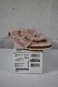 A pair of children's Arizona Shearling fur lined light Rose Birkenstocks (Size UK 13 (31)).